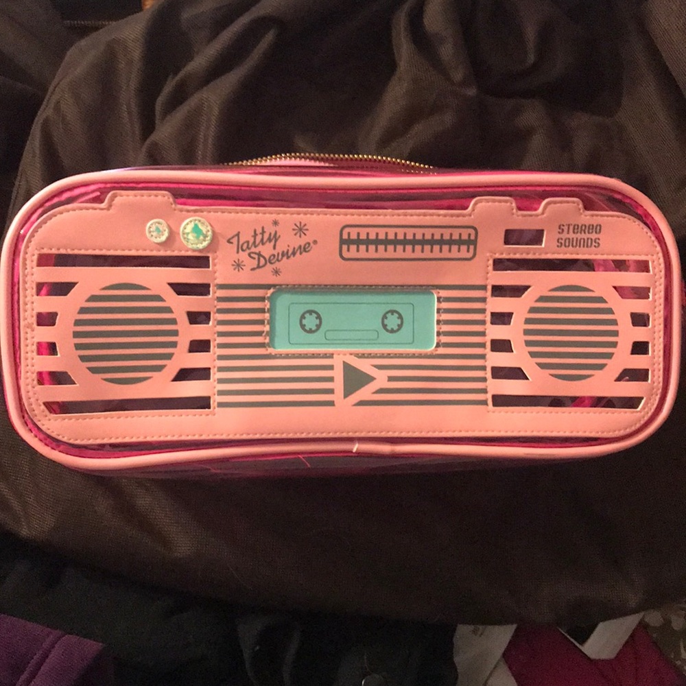 Never used boombox cosmetic bag.